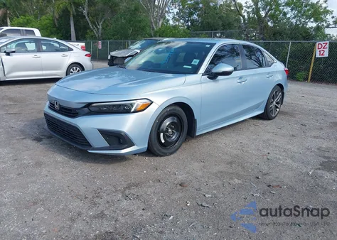 2023 Honda Civic Touring z USA, uszkodzony, nr VIN 2HGFE1F91PH305053